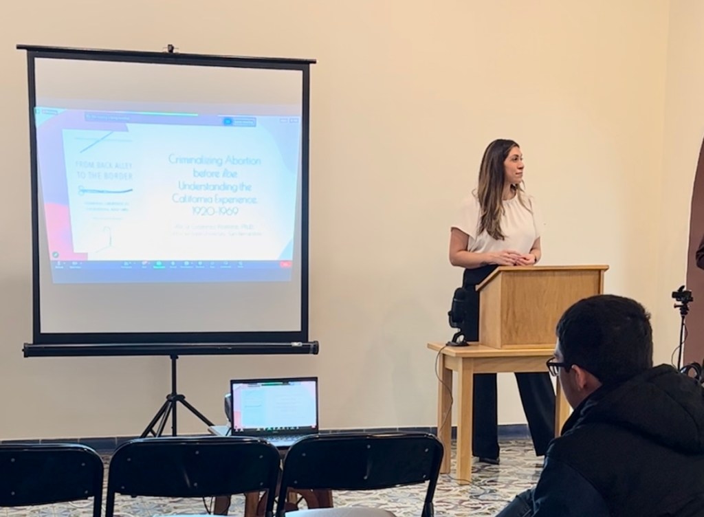 AGR presenting a talk at Texas State University.